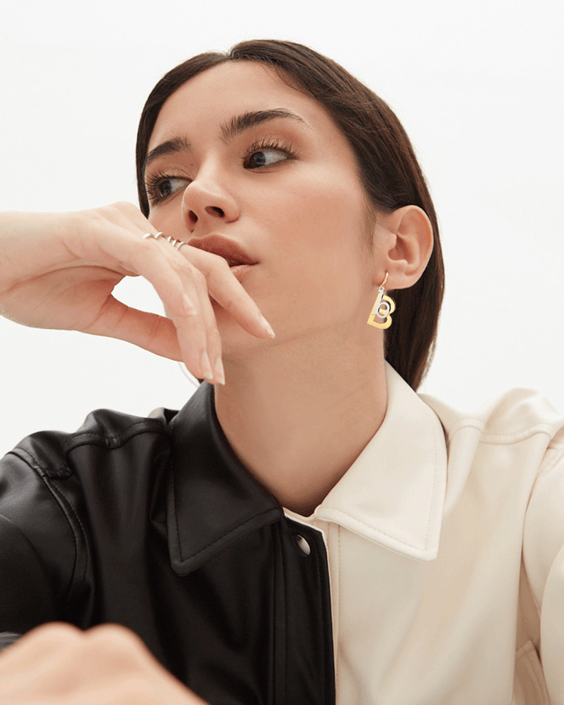 Silver, gold letter earring letra B
